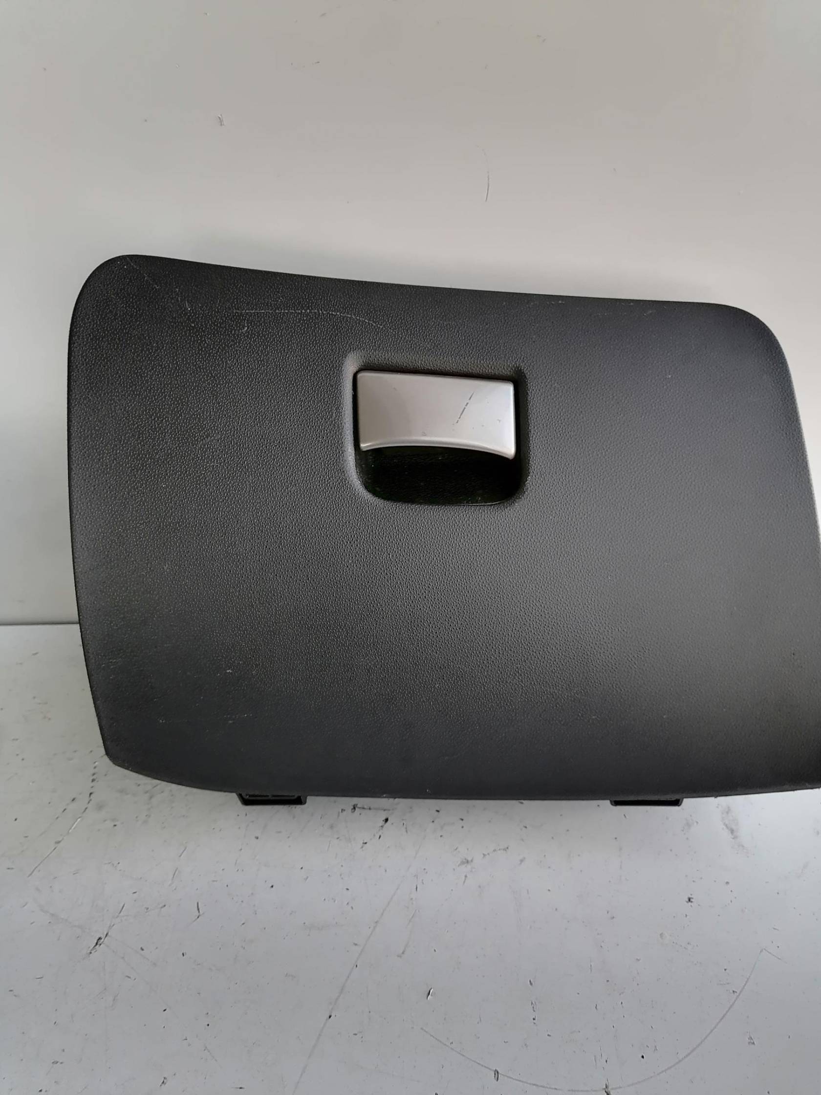 Portaoggetti cruscotto dx.